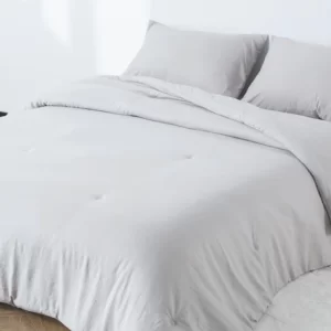 Colcha liso acabamento discreto enbert